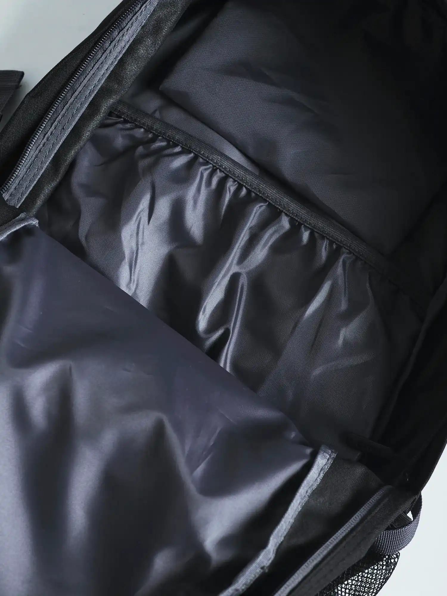 MANTO CROSS Reflective Backpack Negro - Imagen 10